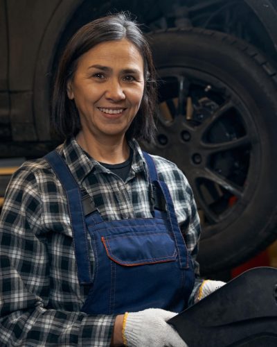 amicable-lady-enjoying-working-as-a-car-technician-2024-10-18-09-04-29-utc.jpg